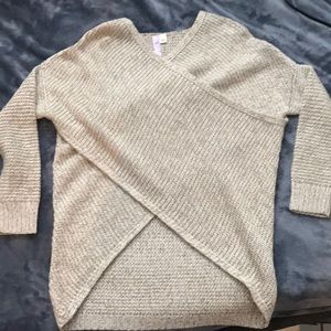 cream colored criss cross sweater